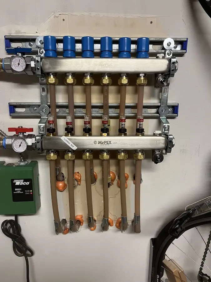 Plumber performing Gas Line Installation at a residential property in Grayson